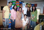 John Abraham strikes a pose with the entire crew. Cheese!