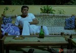A drunk Paresh Rawal mourning his shops loss in OMG Oh My God Movie Stills