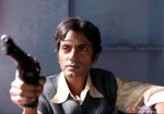 Armed to the teeth - Nawazuddin Siddiqui in Gangs of Wasseypur 2 Movie Stills
