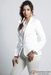Shreya Ghoshal looks elegant and classy in a white formal suit