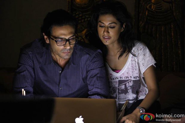 Arjun Rampal and Chitrangda Singh in a still from Inkaar Movie