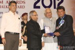 Pranab Mukherjee giving award to Tigmanshu Dhulia