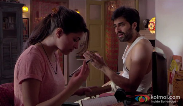 Akshay Oberoi and Parvathy Omanakuttan in a still from movie 'Pizza'