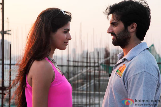 Parvathy Omanakuttan and Akshay Oberoi in a still from movie ‘Pizza’