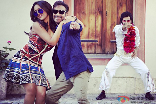 Sonakshi Sinha and Ajay Devgn in a still from movie 'Action Jackson'