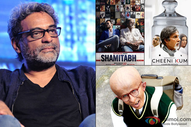 R Balki in a still with his movie posters 'Shamitabh, Cheeni Kum and Paa'