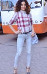 Kangana Ranaut in a chequered Burberry shirt and light colored denims