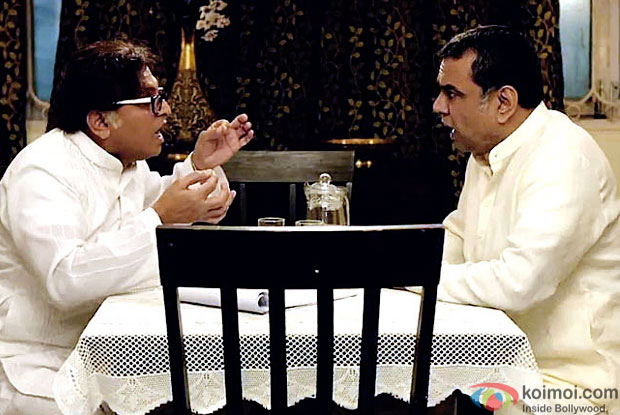 Annu Kapoor and Paresh Rawal in a still from movie 'Dharam Sankat Mein'