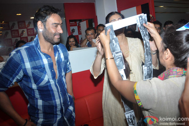 Ajay Devgn and Tabu during the promotion of movie Drishyam at Red FM 93.5