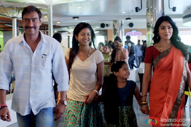 Ajay Devgn, Ishita Dutta and Shriya Saran in a still from movie ‘Drishyam’