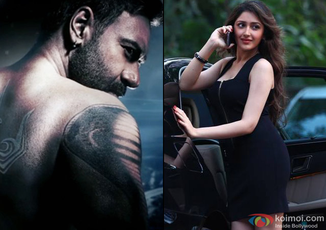 Ajay Devgn and Sayesha Saigal in a still from movie 'Shivaay'