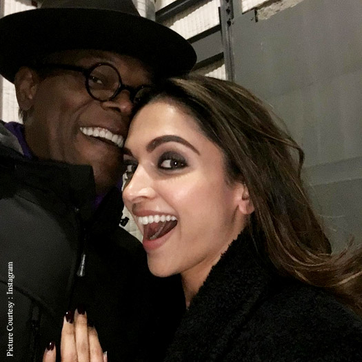 Deepika Padukone and designer Nicolas Ghesquière pose backstage