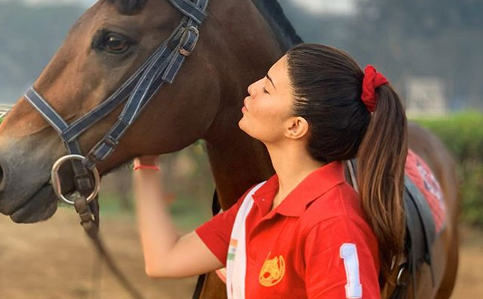 Check Out Who Is Jacqueline Fernandez's 'Sunrise Buddy' Whom She's Kissing In This Recent Picture