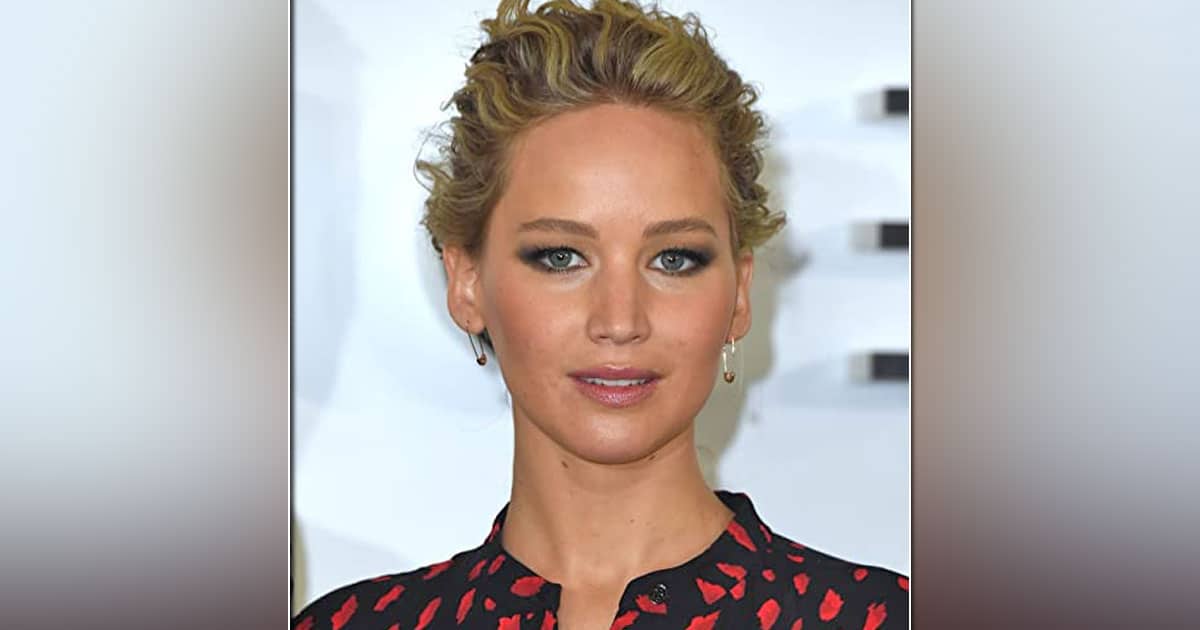 Jennifer Lawrence Flaunts Her Baby Bump In a Shimmery Dior Gown