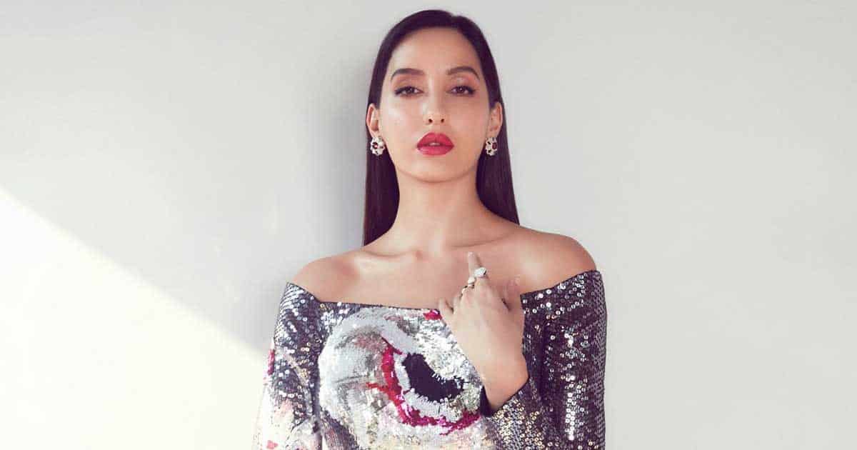 Nora Fatehi Gets Trolled For Slipping Into Blue Floor Sweeping Gown