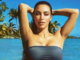 Kim Kardashian Shows Off Her ‘Sun Bum’ In Barely Barely-There Thong Bikini, Netizens Comment “Mommy?”