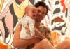 Semi-Naked Harry Styles Cuddling With A Baby In Latest BTS Video Melt Fans Hearts - Watch