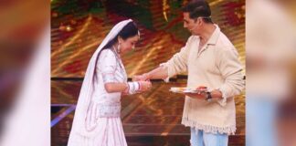 Rupali Ganguly ties a rakhi to Akshay Kumar