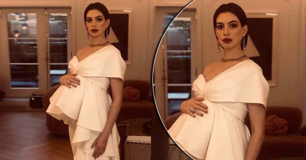 When Anne Hathaway Looked Classy & Chic In A White One-Shoulder Pantsuit, Flaunting Her Baby Bump