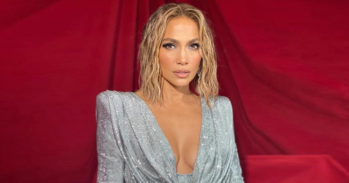 Jennifer Lopez Once Left Us Stunned In A Shimmery Silver Dress That Flaunted Her Assets & Toned Legs