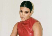 Kourtney Kardashian Stuns In A Silver Mesh Top & Skirt That Exposes Her B*tt