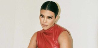 Kourtney Kardashian Stuns In A Silver Mesh Top & Skirt That Exposes Her B*tt