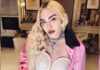 Madonna flashes bare bust in risque video after begging trolls to 'stop bullying' her