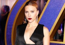 Scarlett Johansson Once Walked A Red Carpet In A Silver Body-Hugging Dress With A Sheer Back