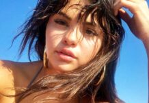 Selena Gomez Once Posed In A Cute Yellow Bikini That Exposed Her Assets Covered In Sand