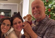 Bruce Willis's holiday season pics show him cuddling with a pup