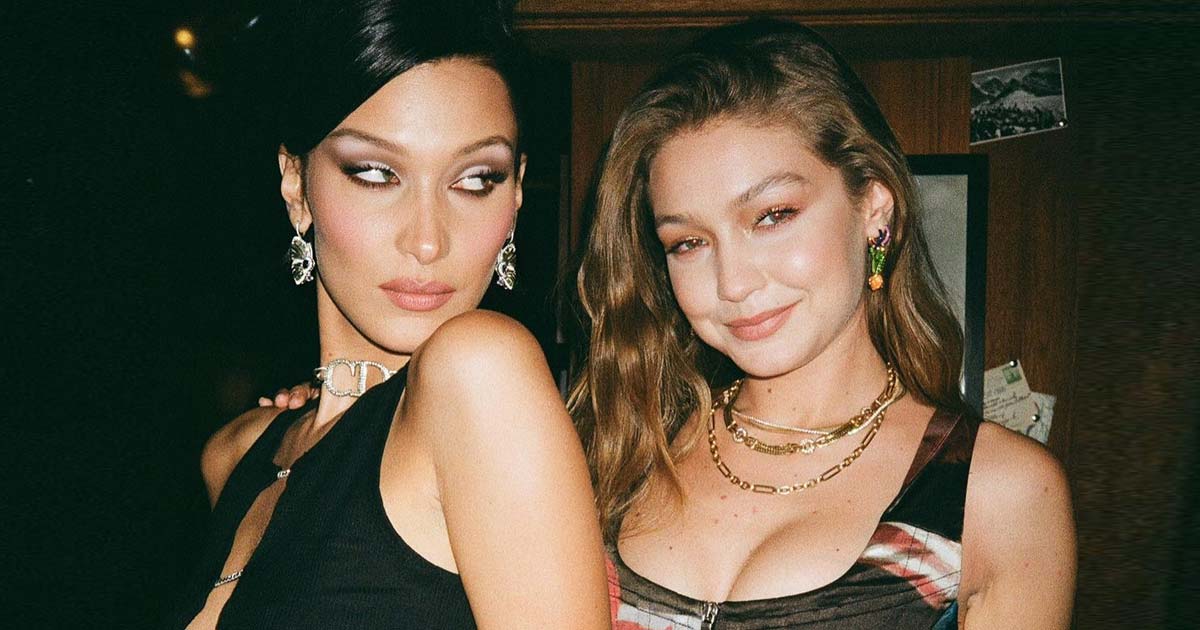 Gigi Hadid & Bella Hadid Once Turned Biblical Eves Covered In Just A Serpent & Versace Bags