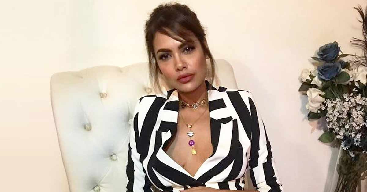 When Esha Gupta Raised The Temperature By Going Braless In A Monochrome Stripe Pantsuit