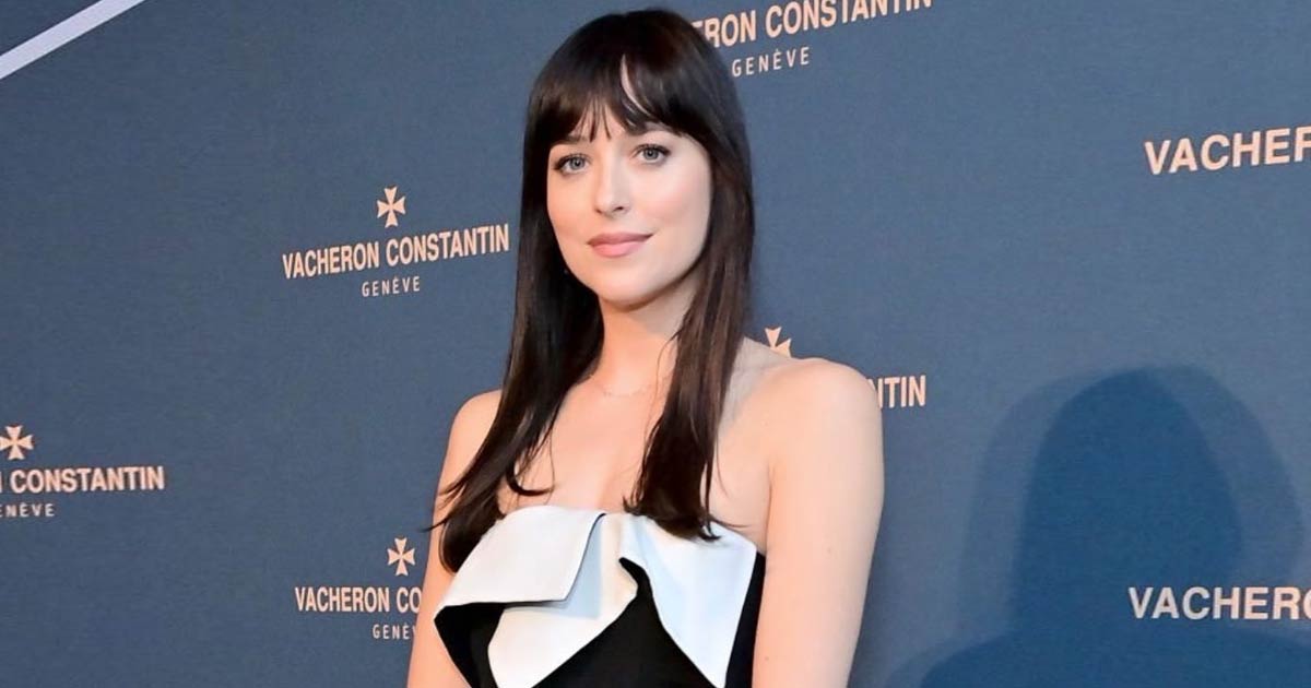 Dakota Johnson Once Rocked A Deep Neck Plunging Outfit With Bold Red Lips & S*xy Curls