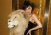Kylie Jenner Turns Into A S*xy Huntress Dressed In A Figure-Hugging Black Dress With A Huge Lion's Head On Her Shoulders – Here’s How Netizens React