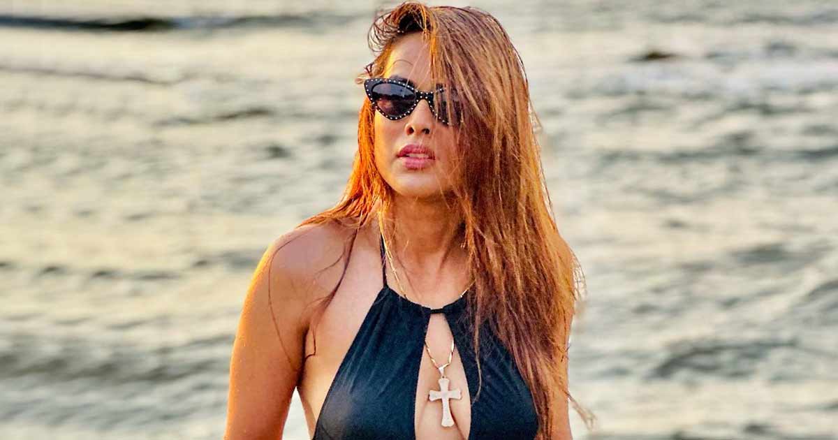 Nia Sharma Reveals Her Sensuous Strikes In A Cle*vage Revealing Monokini By The Seashore, Netizens Troll “Day By Day Vulgar Hote Jaa Rahi Hai”