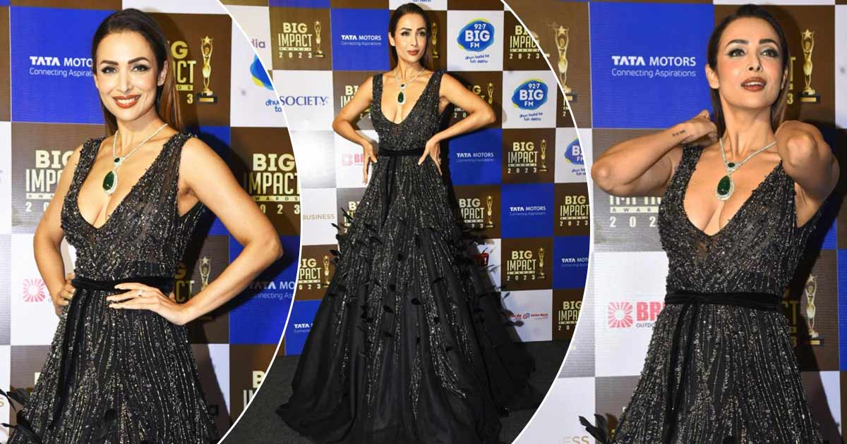 Malaika Arora Places On A Busty Show In This Too S*xy To Deal with Black Feather Robe Setting Web On Fireplace!