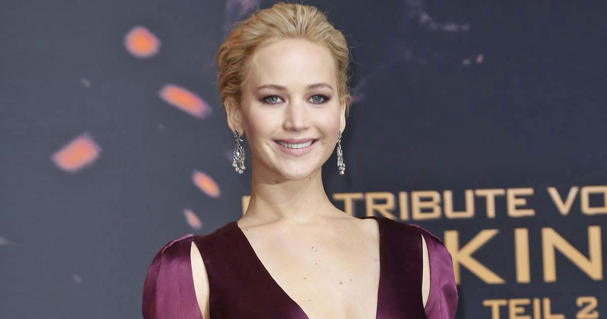 When Jennifer Lawrence Set The Streets On Fireplace Sporting A Clear Gown With A Minimize In The Center In A Plunging Neckline Apparel