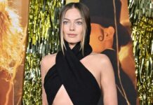 Margot Robbie Sparkles In A Black Sequinned Body Hugging Gown At The Oscars 2023