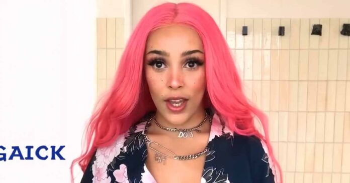 Doja Cat Flaunts Her New Tattoo Going Topless In NSFW Pictures