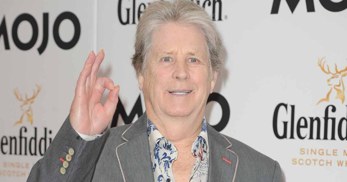 Brian Wilson so strung out on drugs he forgot he met John Lennon THREE times at same party: ‘He was toasted by demons and lost in a fog!’