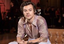 Harry Styles flaunts giant tattoos as he takes a dip in pond