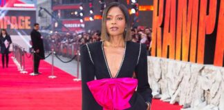 Naomie Harris bullied at school for having deadly spine curvature condition that forced her to wear back brace