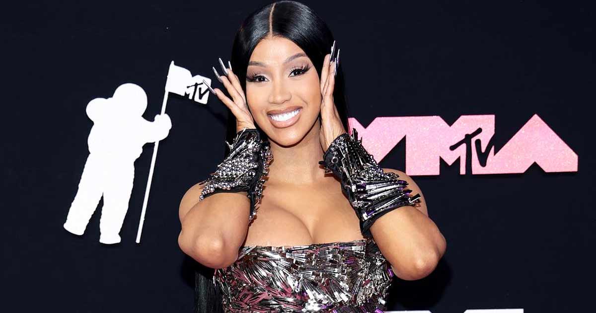 Cardi B Flaunts Her Busty Assets In A Plunging Satin & Lace Red Gown As She Confidently Greets The Paps Post Her 31st Birthday Celebration With Offset
