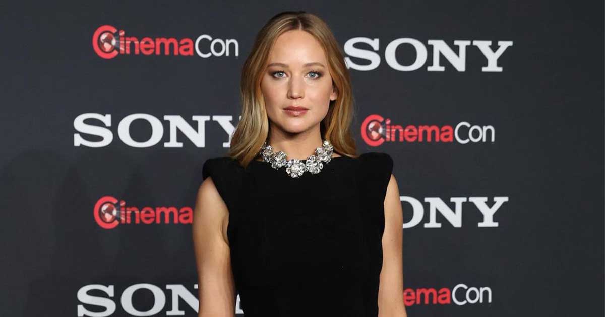 When Jennifer Lawrence Got The World Talking As She Flaunted Her Assets In Plunging Black High-Slit Dress As Her Male Co-Stars Bundled Up To Face London's Harsh Cold